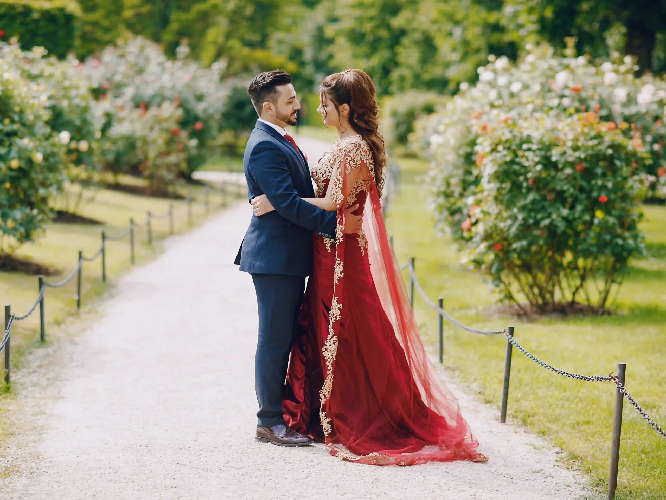 beautiful-woman-long-red-dress-walks-around-city-with-her-husband